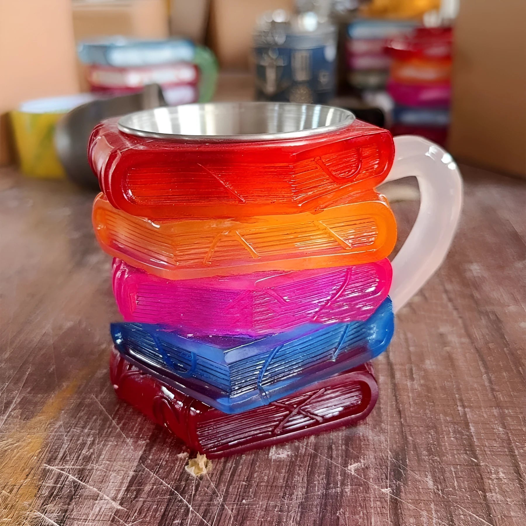 Hand-painted resin decorative cup with library design, 13 cm tall.