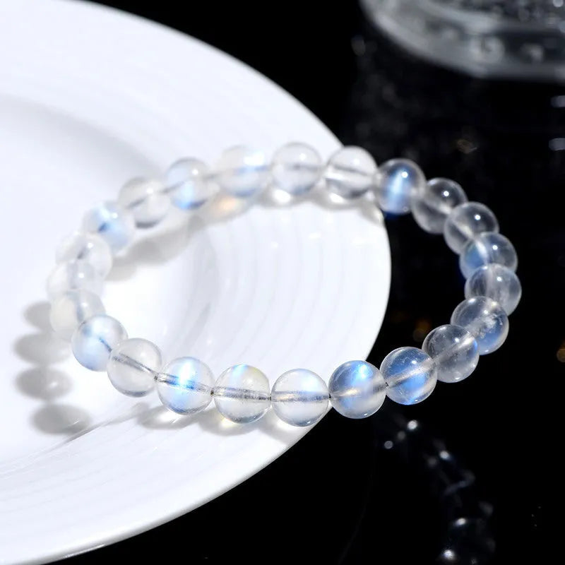 Natural cream body blue moonlight crystal bracelet in a minimalist unisex style.