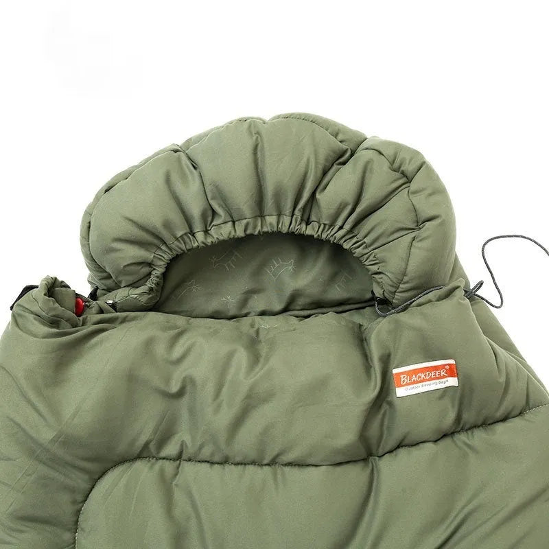 Ochre and olive green portable cotton camping sleeping bag quilt laid flat.