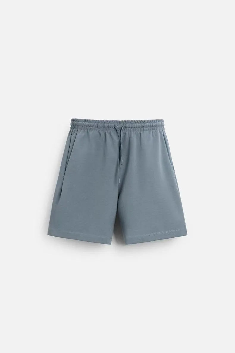 Loose-fitting polyester co-ord set with short sleeve T-shirt and matching shorts in four colour options