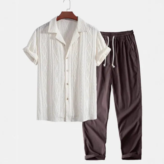 Slim-fit linen-polyester casual suit with camouflage print, showing short-sleeved cardigan shirt and matching trousers.