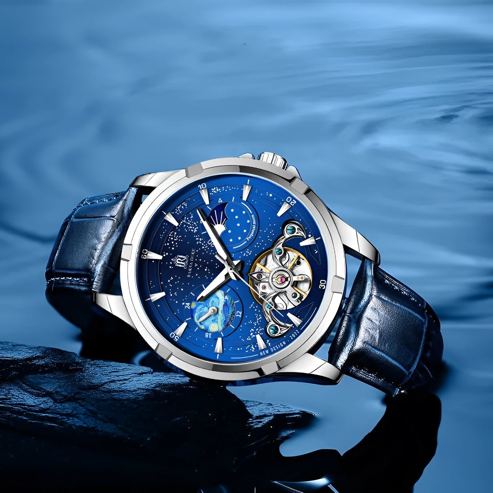 Men's blue automatic mechanical watch with leather strap on wrist, showing 42mm case.