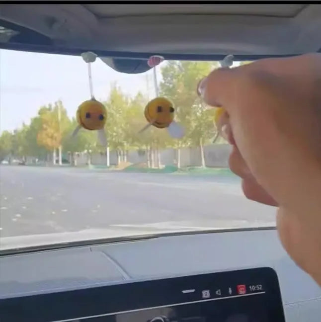 Cartoon bee car decoration with furry texture and swing spring on car dashboard