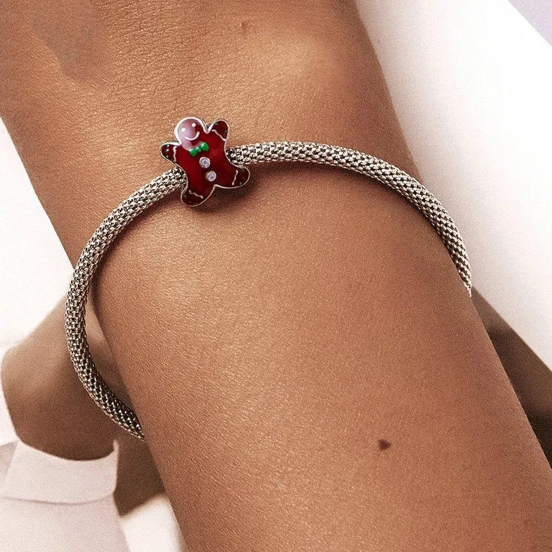 Christmas gingerbread man 925 sterling silver bead with dripping oil finish, 1.2cm height, 0.5cm aperture, on white background