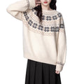 Women's milky white fair isle geometric pattern pullover sweater with a crew neck and long sleeves.