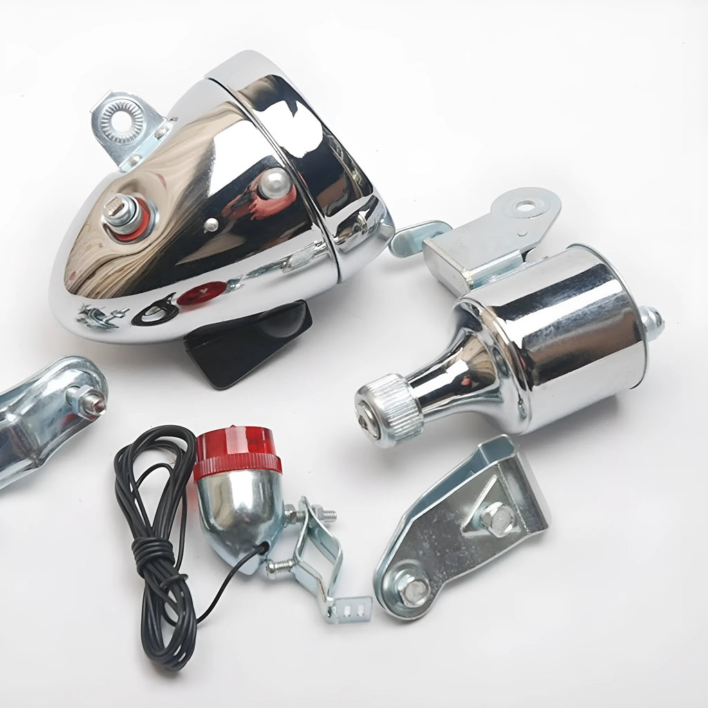 Silver bicycle dynamo-powered generator light kit for front fork or rear frame mounting.