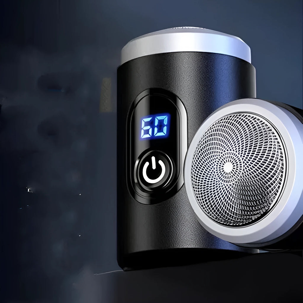 Black portable rechargeable shaver with USB cable and cleaning brush on a white background.
