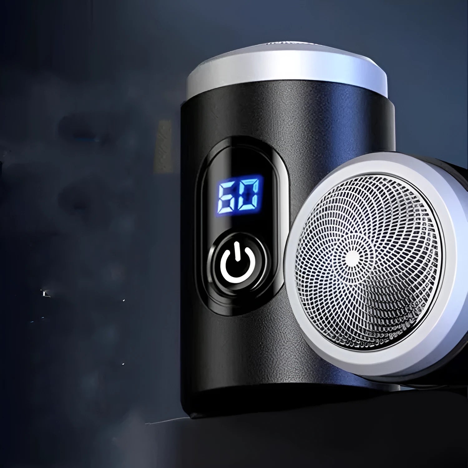 Black portable rechargeable shaver with USB cable and cleaning brush on a white background.
