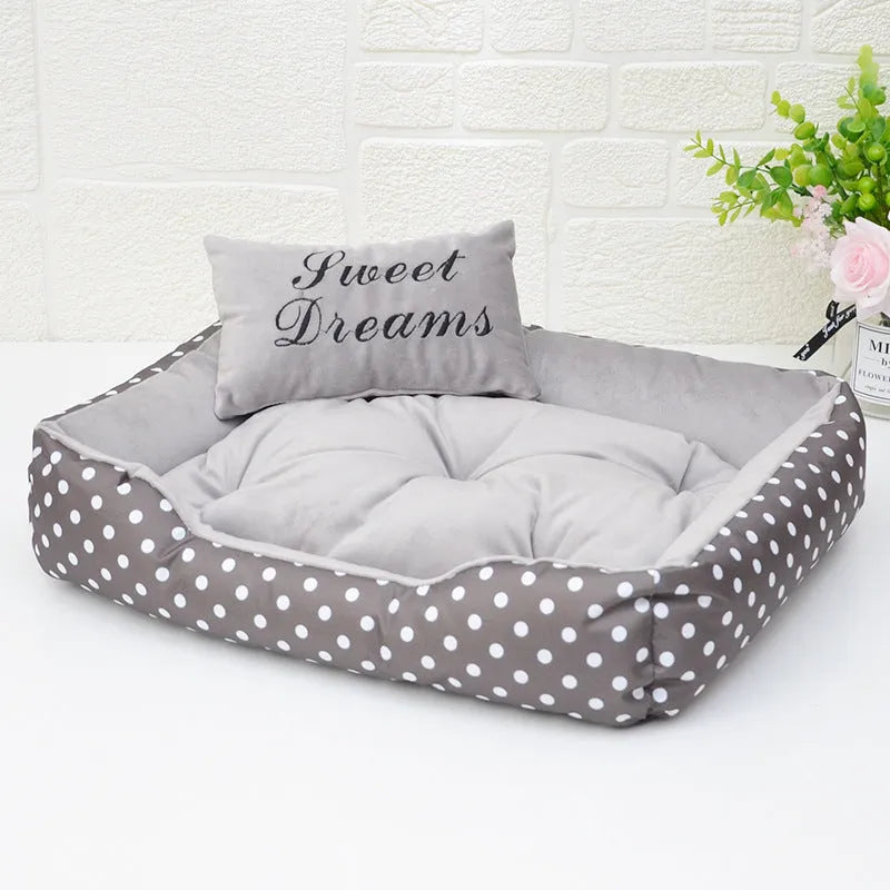 Polka dot printed square dog bed with matching pillow in grey, blue, pink, or rose red.