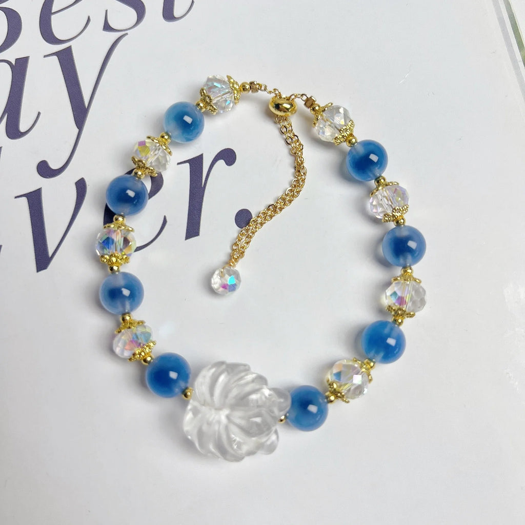 Handmade blue glazed agate nine tail fox bracelet on white background