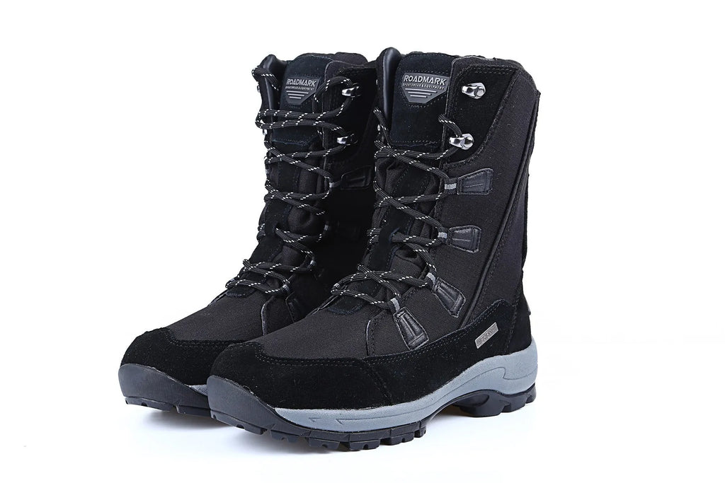 Women's black genuine leather mid-calf snow boots with round toe and thick rubber sole on a white background.
