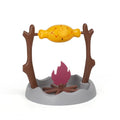Barbecue style plastic tumbling cat food feeder toy on a white background.