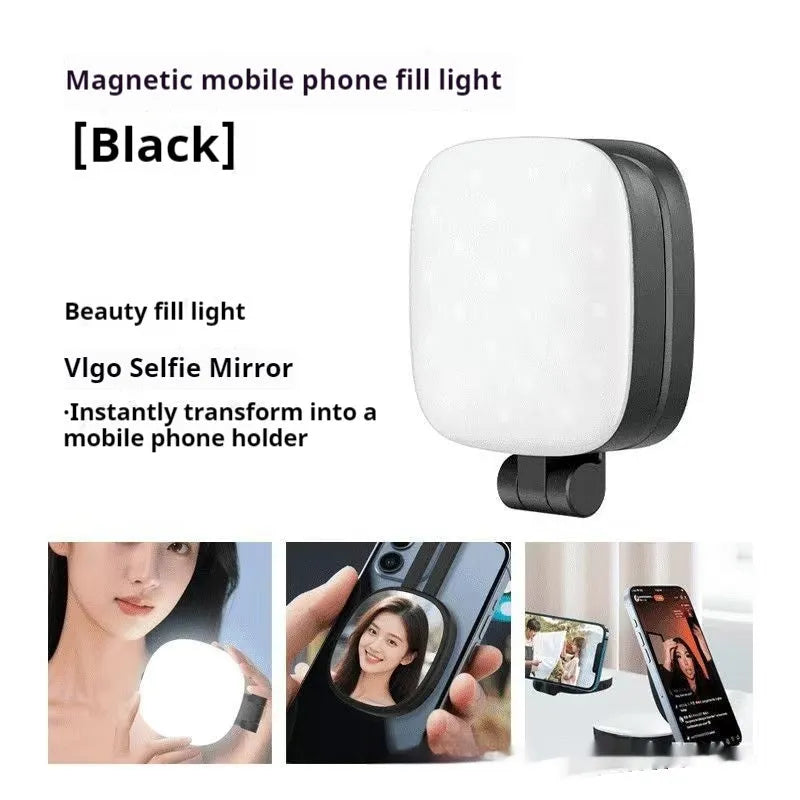 Black and white mini portable fill light with magnetic phone holder, showing three colour temperature buttons and a dimming slider.