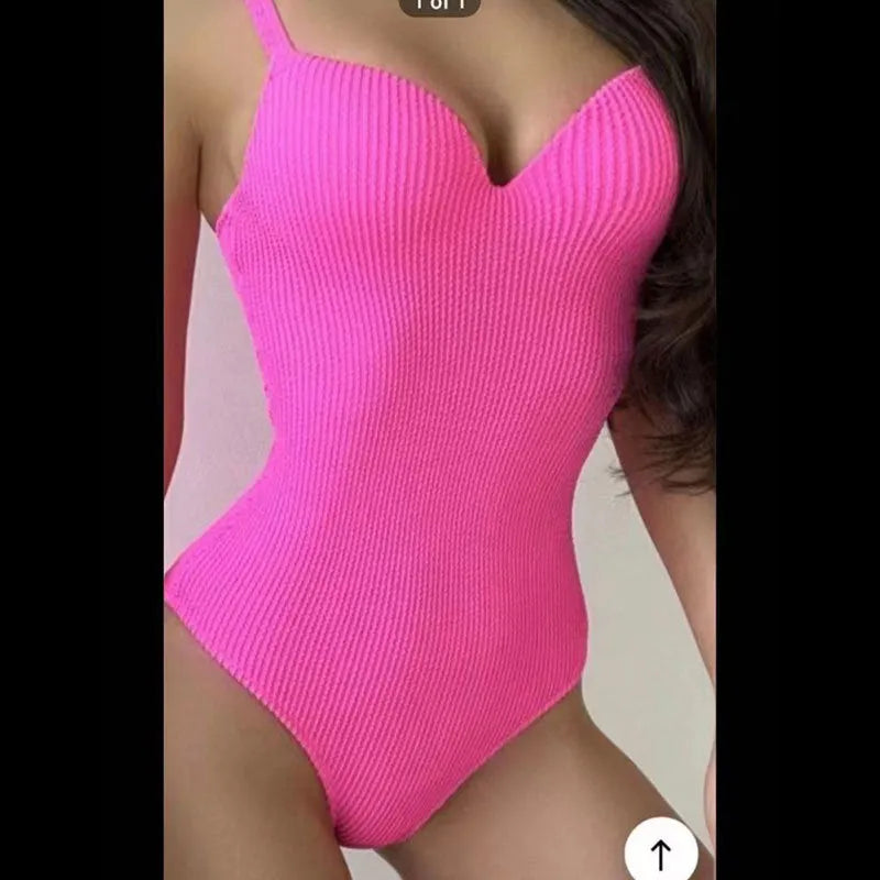Women's sleeveless one-piece swimsuit in polyester fabric for swimming.