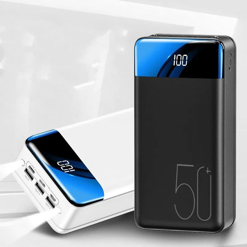 Black and white large capacity 50000mAh power bank with three USB output ports.