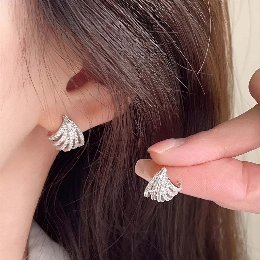 Geometric line design earrings with zircon stones in platinum colour electroplated finish
