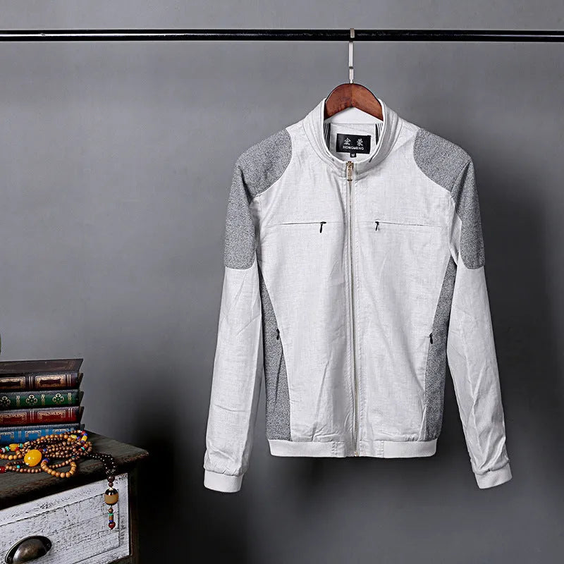 Men's thin colour block linen jacket in blue, grass green, or heather grey on a hanger.