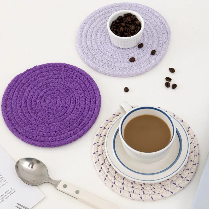 Three round 18cm cotton cord coaster placemats in modern minimalist design