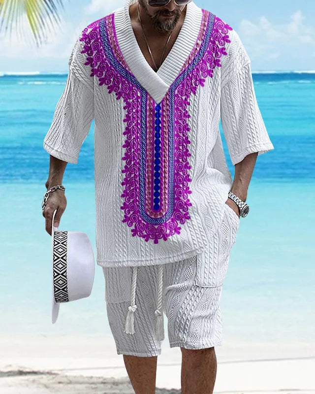 Men's grey knitted short-sleeved drop-shoulder top with matching shorts laid flat.