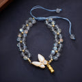 Gray moonstone bracelet with butterfly woven rope design and geometric retro styling
