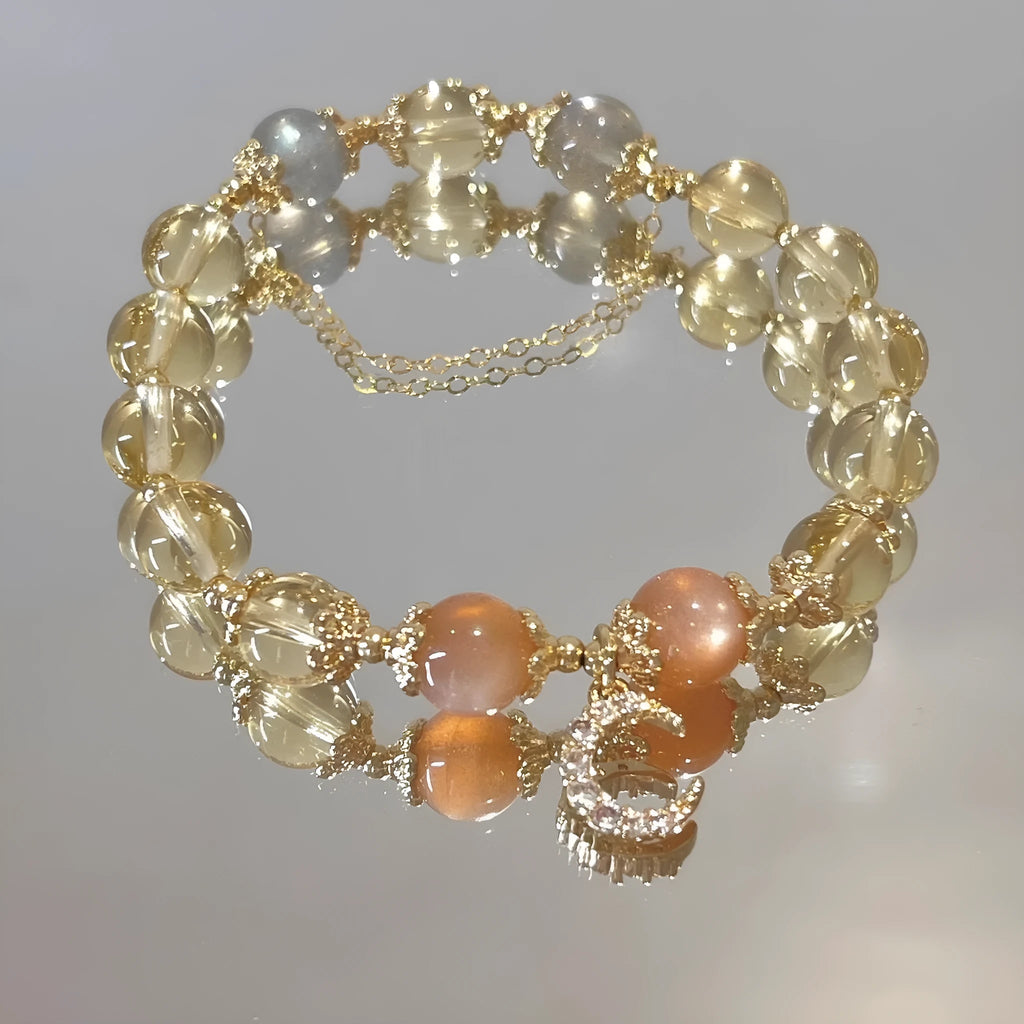 Chinese style women's crystal bracelet with 14K gold electroplating, moonstone, and golden sun stone fortune crystal design