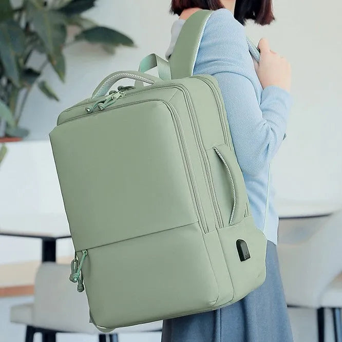 Waterproof Oxford cloth backpack in business style with air pillow belt system, shown in multiple colour options