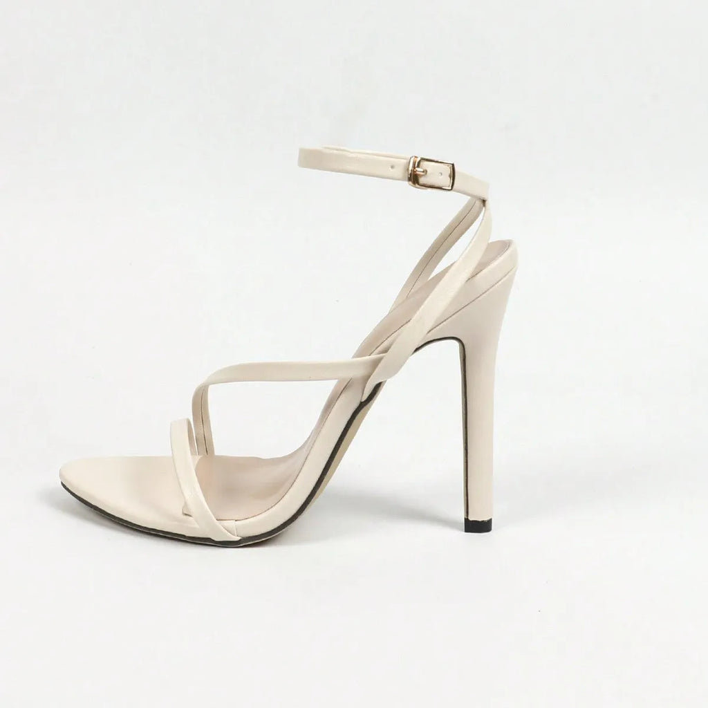 Women's gold high heel sandals with open toe and cross ankle strap design