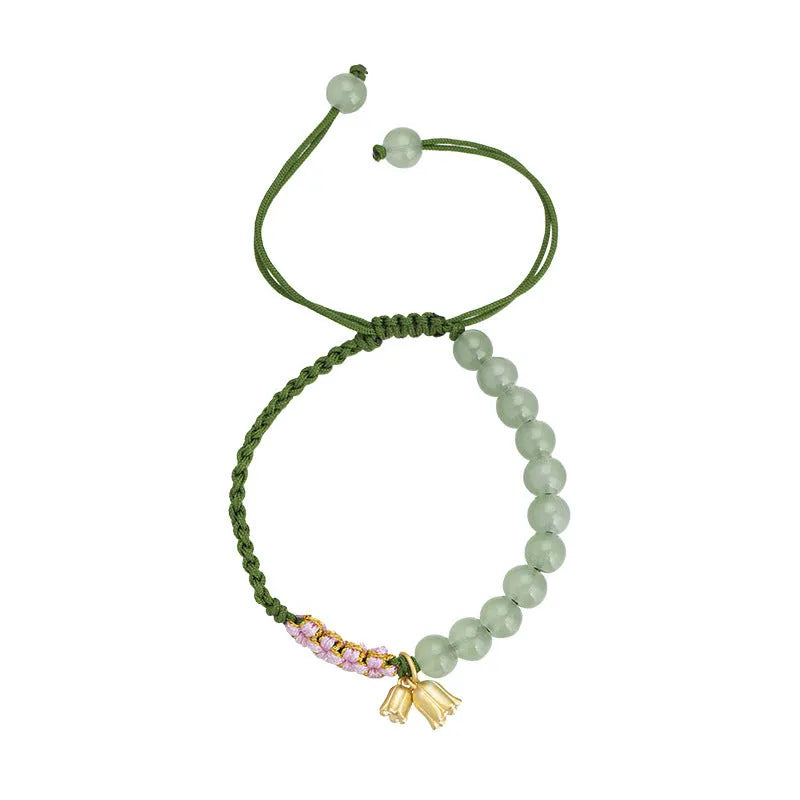 Lily hand woven red rope bracelet with flower elements and national style design