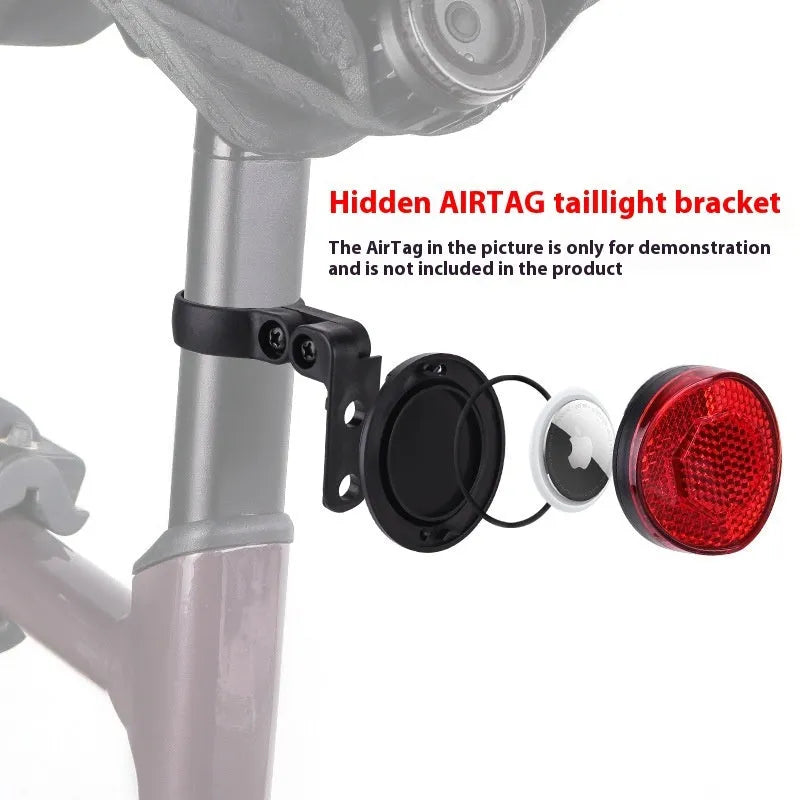 Red plastic anti-theft bicycle taillight bracket mounted on seat post with reflective surface