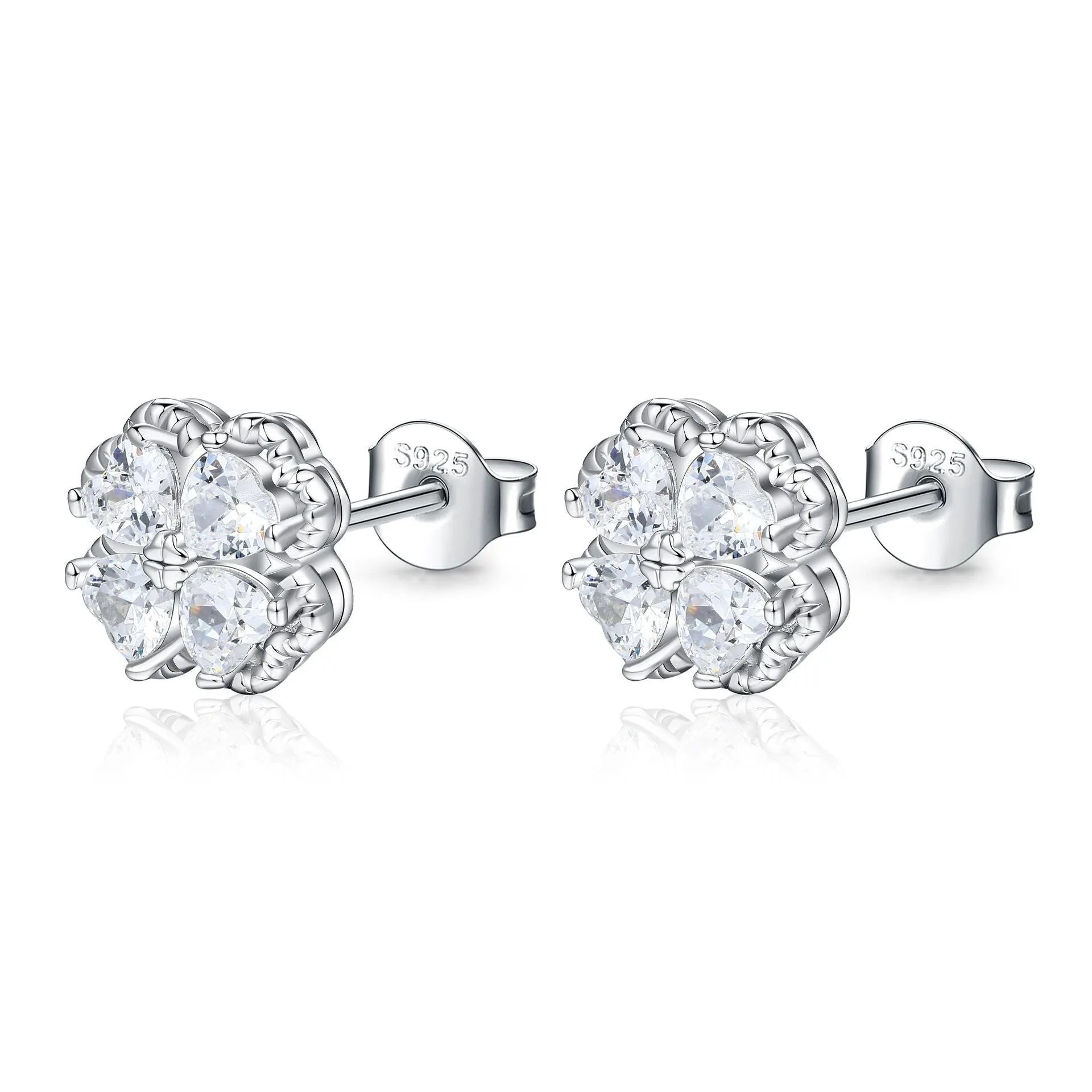 Pair of silver heart-shaped earrings with a four-leaf clover design and zircon stones in white gold colour.
