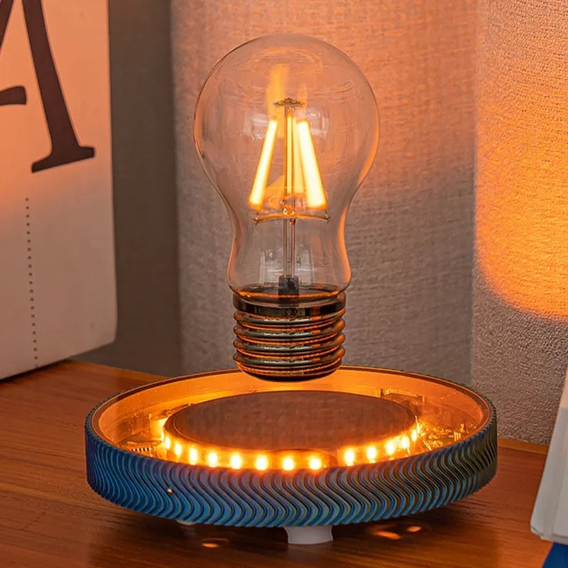 Small magnetic levitating moon lamp floating above its base on a table