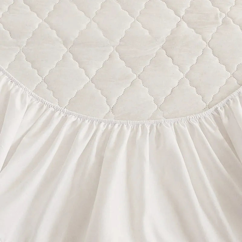 Diamond lattice quilted waterproof mattress protector fitted sheet in bamboo fibre.