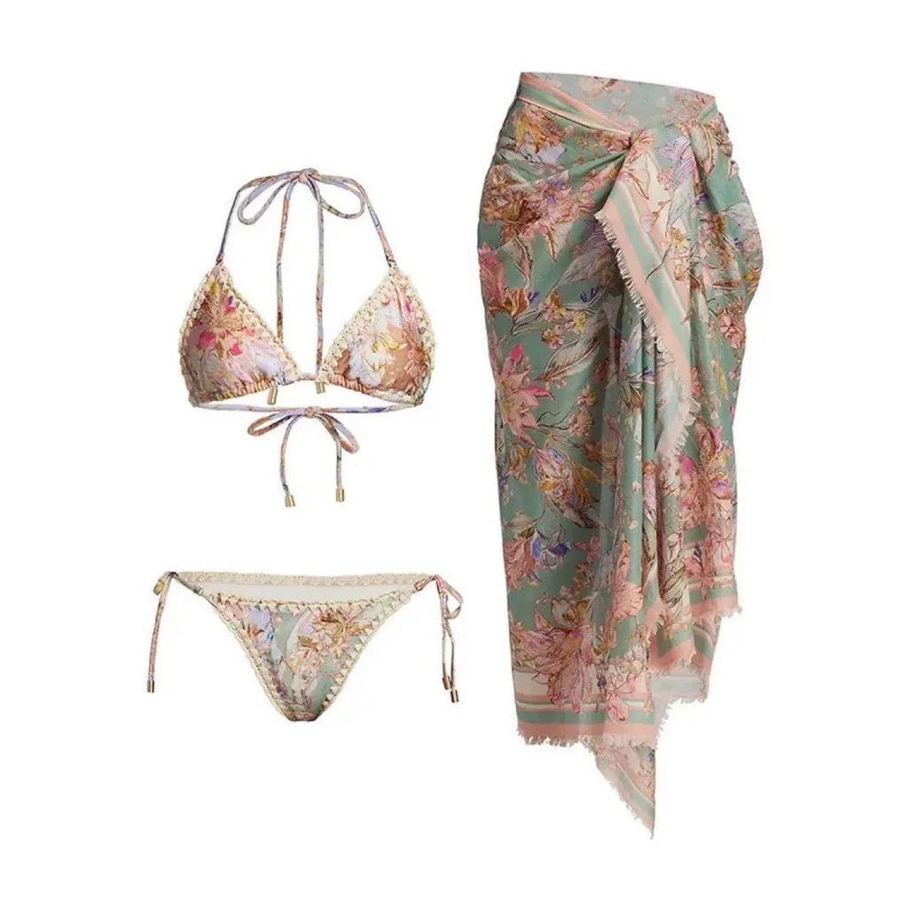 Women's creamy-white floral pattern bikini suit with matching skirt