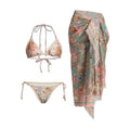 Women's creamy-white floral pattern bikini suit with matching skirt
