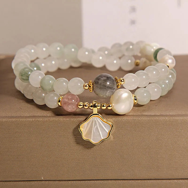 Tianshan Emerald Green Crystal Bracelet with apricot leaf pendant and gold-plated gemstone details