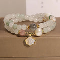 Tianshan Emerald Green Crystal Bracelet with apricot leaf pendant and gold-plated gemstone details
