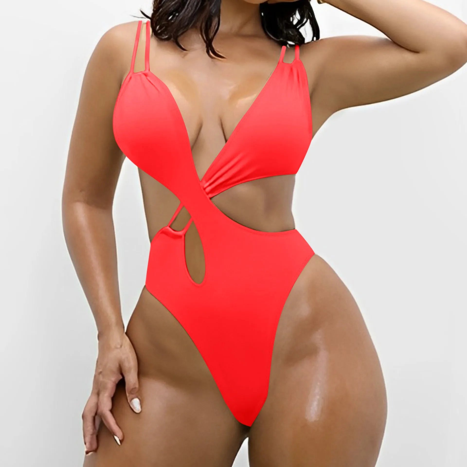 Women's solid colour backless one-piece triangle swimsuit on a mannequin