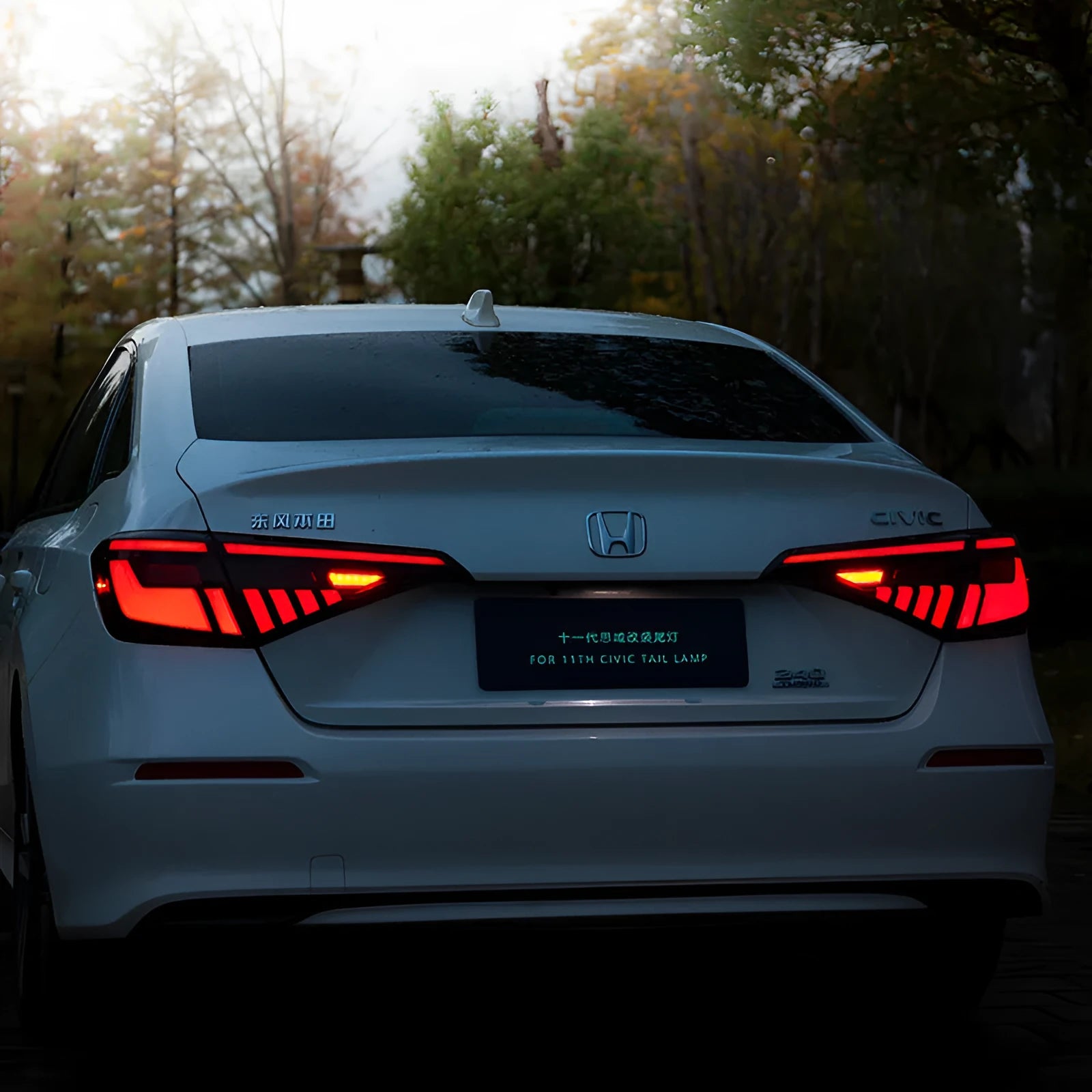 Black and red modified LED tail light assembly for 11th Generation Honda Civic.