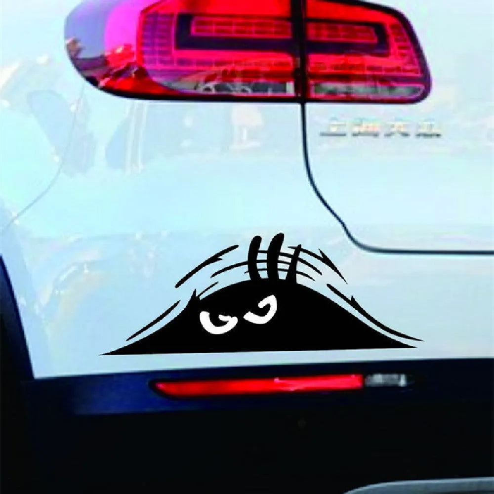 Large black smiley face self adhesive body sticker measuring 19cm by 7cm on skin