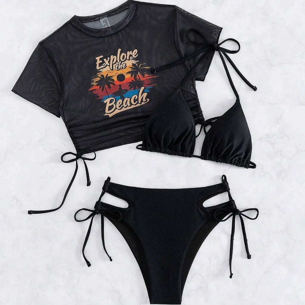 Women's three-piece bikini swimsuit set in black, showing short-sleeved top and pants.