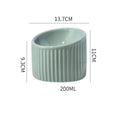 Elevated ceramic cat bowl in light green colour with tilted round design for comfortable feeding
