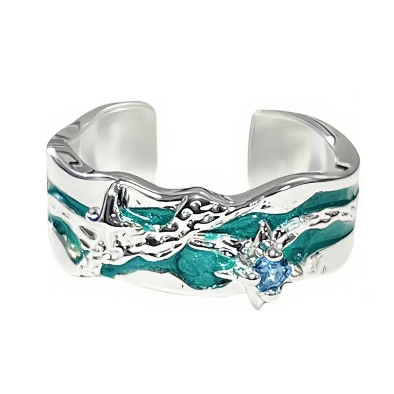 Mint green enamel asterism ring with copper construction and eight-awm star design