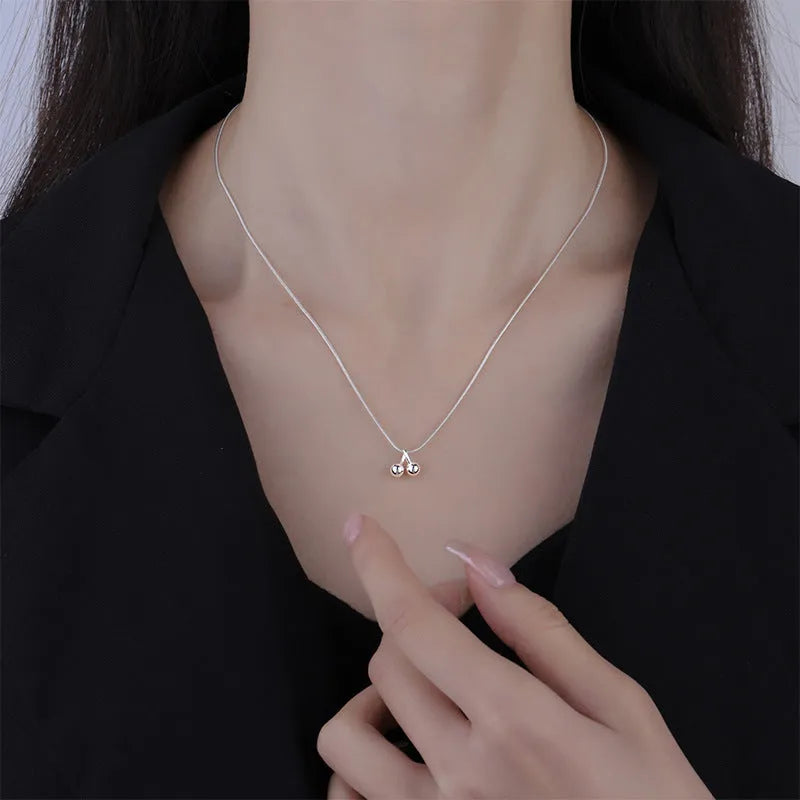 S925 silver adjustable necklace with a cherry pendant on a snake bone chain.