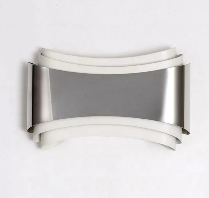 Modern white LED wall lamp with rectangular PMMA shade on a wall.