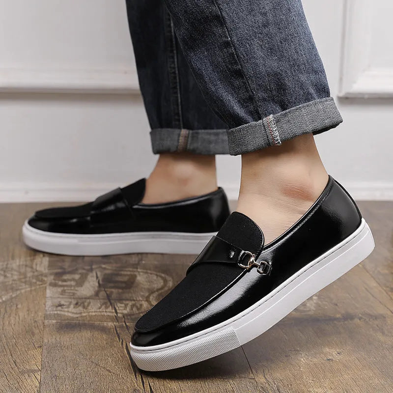 Men's black leather slip-on shoes with horsebit buckle and round toe design