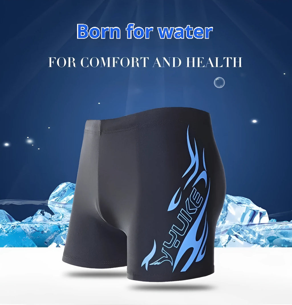 Men's plus size blue fire pattern boxer swimming trunks and matching swimming cap laid flat.