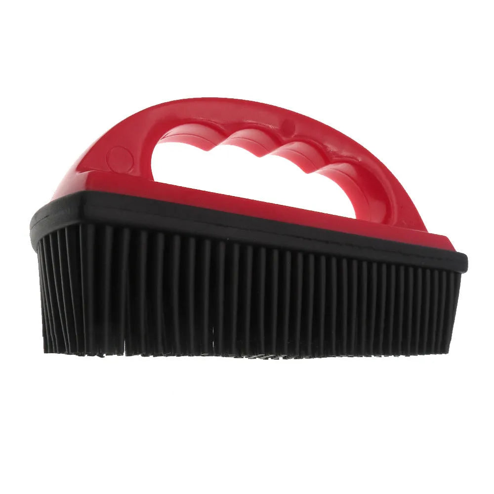 Red silicone pet hair removal brush with oval head measuring 160mm by 85mm.