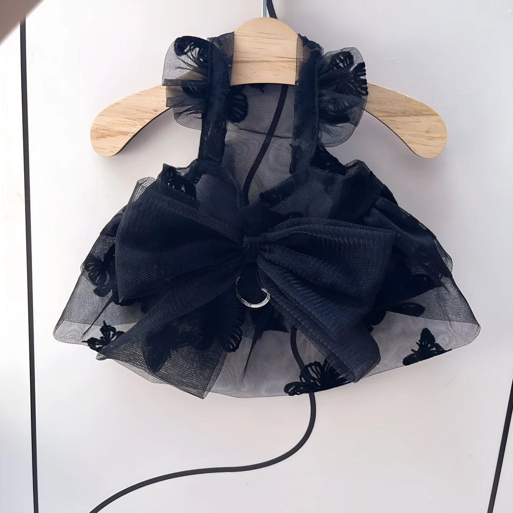 Black gauze princess skirt for a small dog on a mannequin, showing tulle material.