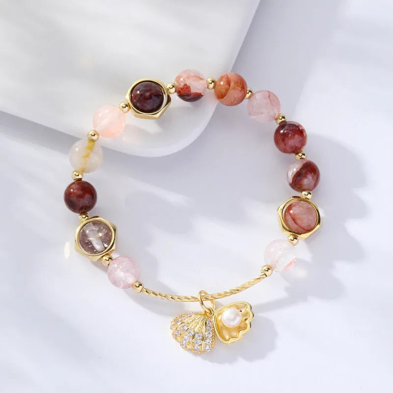 Colourful crystal bracelet with hair crystal shell and red sealant flower shell designs
