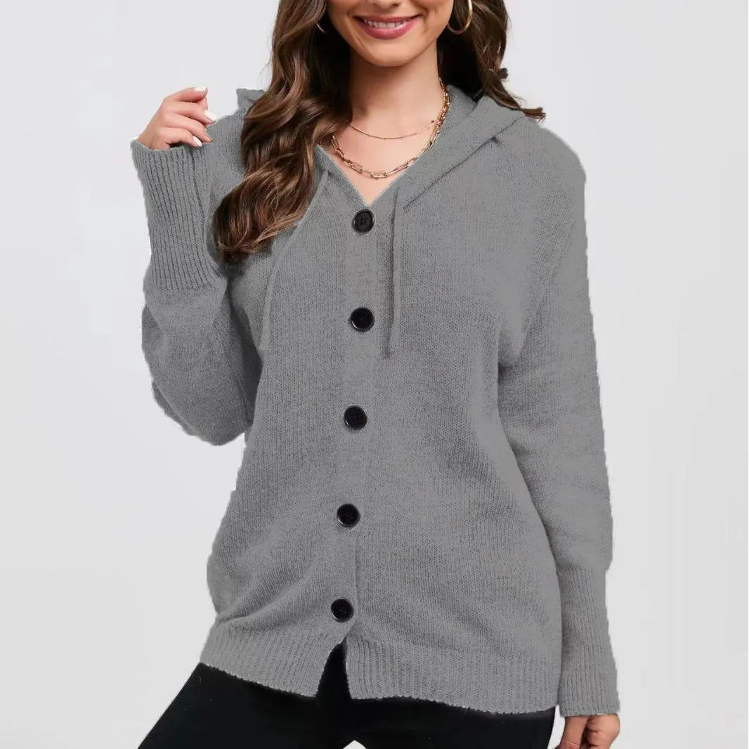 Women's loose fit cotton hooded cardigan sweater in a solid colour with textured pattern.